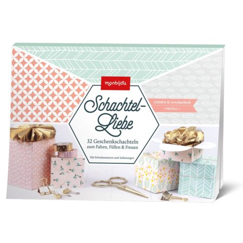 Ein pastellfarbenes Geschenkbox-Set mit Mustern und Montageanleitung.