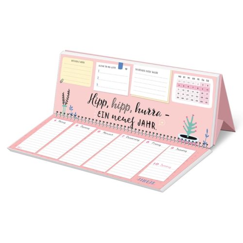 Ein rosa Tischkalender mit Feldern für Notizen, einer Monatsansicht und dekorativen Pflanzen. Text auf Deutsch.