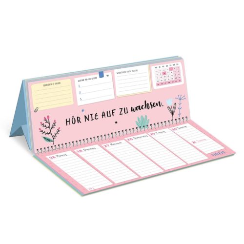 Tischkalender auf Deutsch mit Blumendekor und dem Spruch „Hör nie auf zu wachsen“.