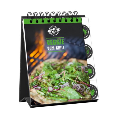 Spiralgebundenes „Veggie vom Grill“-Kochbuch mit einem Coverbild einer gegrillten Pizza mit Gemüse und roten Zwiebeln.