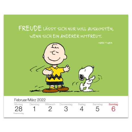 Karikatur eines tanzenden Jungen und Hundes, mit einem Zitat von Mark Twain auf Deutsch, auf einem Kalender für Februar/März 2022.