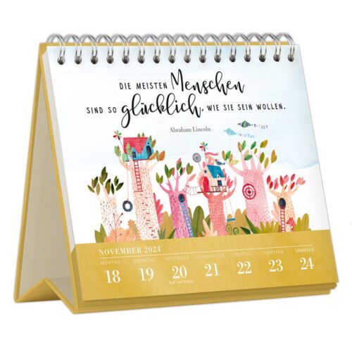 Ein Tischkalender für 2024 mit einer skurrilen Baumhausillustration und einem deutschen Zitat, das Abraham Lincoln zugeschrieben wird.